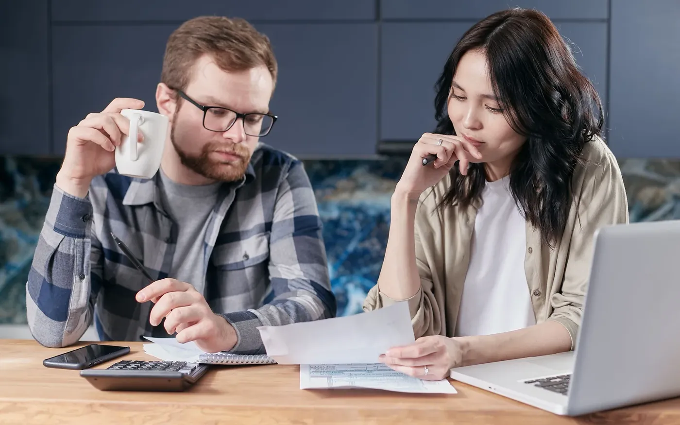 Couple reading a term life policy summary together